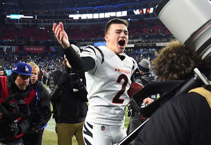 Jan 22, 2022; Nashville, Tennessee, USA; Cincinnati Bengals kicker Evan McPherson (2) celebrates after making a game-winning 52-yard field goal as time expired during the AFC Divisional playoff football game against the Tennessee Titans at Nissan Stadium. The Bengals won the game 19-16. Mandatory Credit: Christopher Hanewinckel-USA TODAY Sports